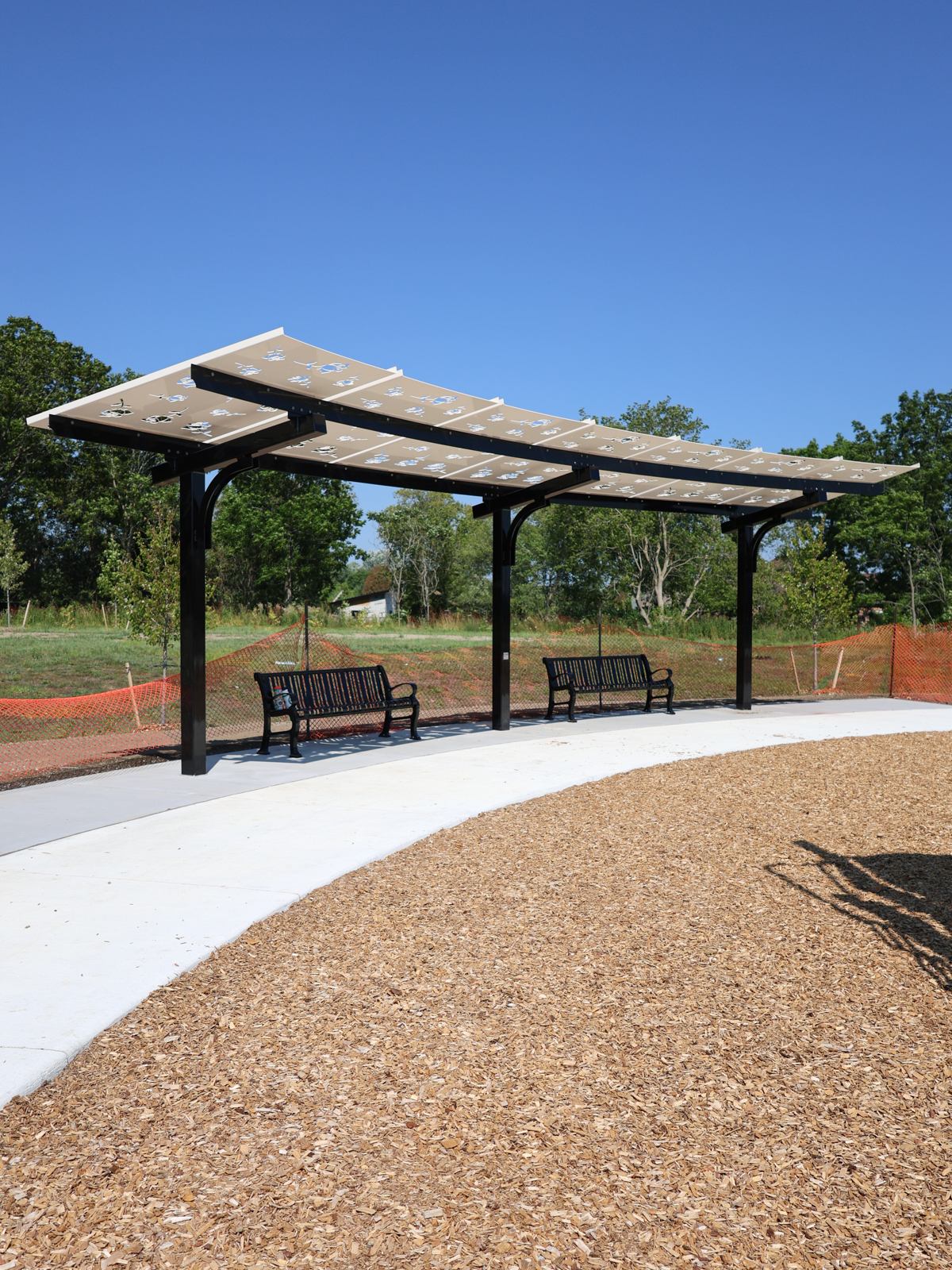 Shade structure with benches